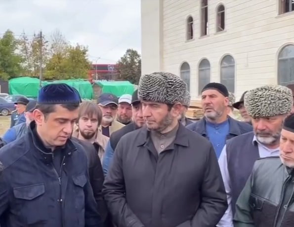 Barakhoev (left) refutes the allegations during a public event in Malgobek. Screenshot: Telegram