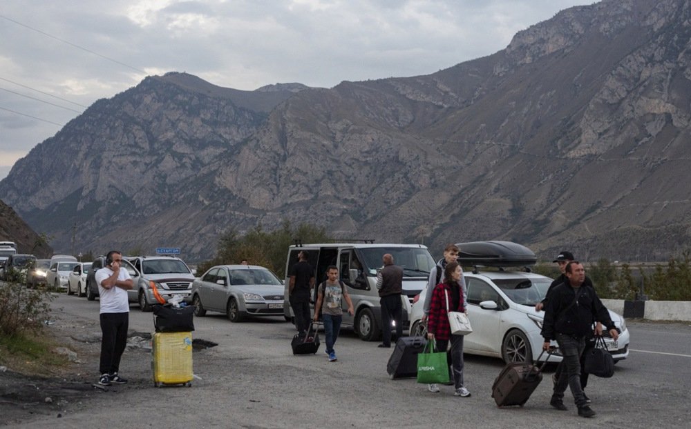 People approach customs at the Russia-Georgia border checkpoint of Verkhny Lars, Russia, 30 September 2022. EPA-EFE/OLGA IUNASHEVA