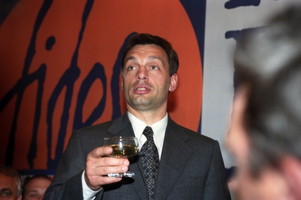 Prime Minister candidate Viktor Orbán drinks champagne in the headquarters of the Fidesz-Hungarian Civic Union in Budapest, Hungary, 24 May 1998. Photo: EPA/ATTILA KISBENEDEK