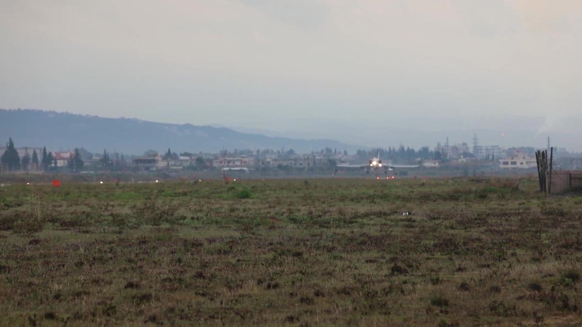 During the landing of one of the Russian planes, the populated areas adjacent to the base appear. Screenshot from a video by the Russian Ministry of Defence