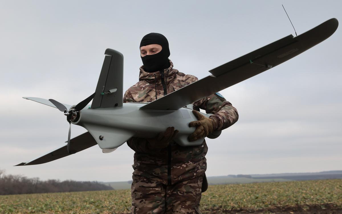 A soldier from Ukraine's Territorial Defence Forces handles a drone. Photo: EPA-EFE/KATERYNA KLOCHKO