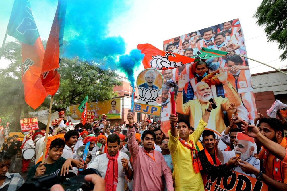 Supporters celebrate as Narendra Modi claims victory in India’s elections in June. Photo: EPA-EFE/HARISH TYAGI