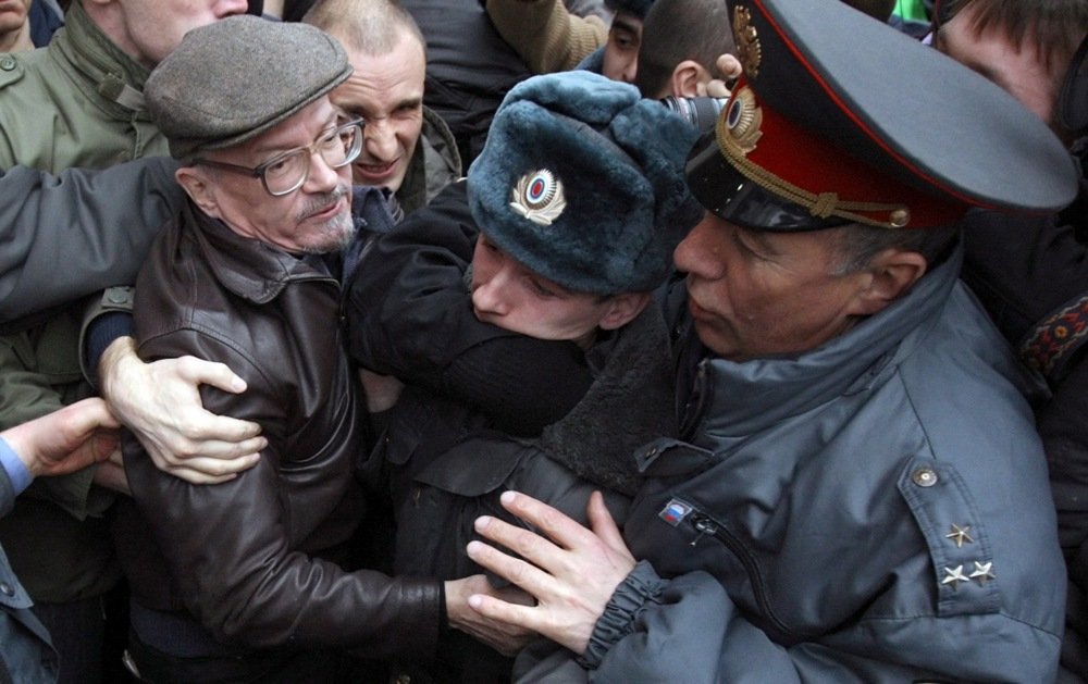 Russian riot police detain Eduard Limonov during a protest in Moscow, 31 March 2010. Photo: EPA/SERGEY ILNITSKY