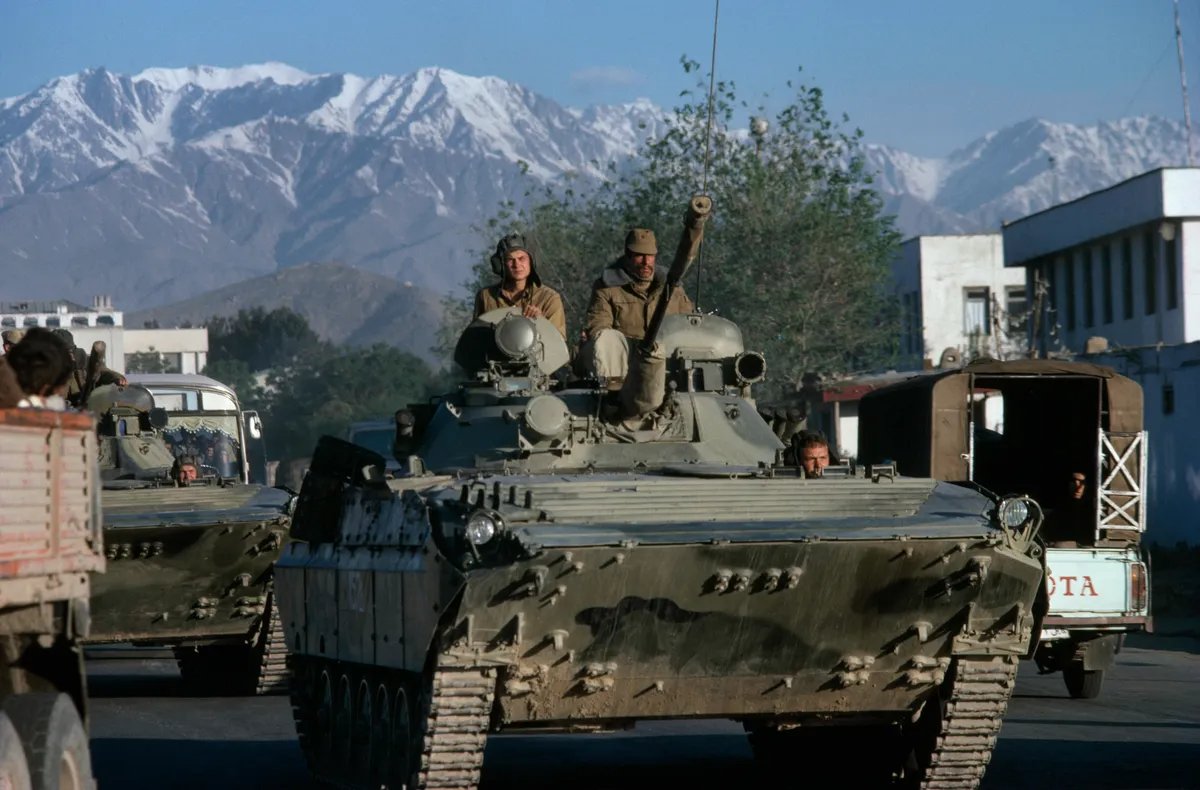 View of Soviet army soldiers in a armored vehicle during a patrol, Kabul, Afghanistan, 1988. Photo: Robert Nickelsberg / Getty Images