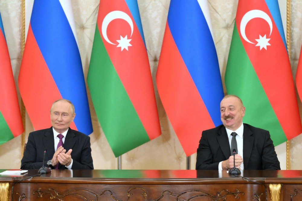 Vladimir Putin and Azerbaijani President Ilham Aliyev attend a signing ceremony following a meeting outside Baku, Azerbaijan, 19 August 2024. Photo: EPA-EFE/GRIGORY SYSOEV / SPUTNIK / KREMLIN POOL