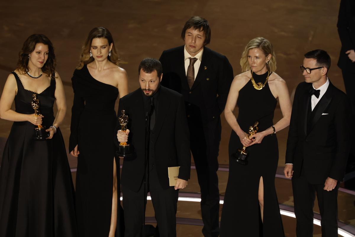 Mstyslav Chernov accepting the Oscar for Documentary Feature Film at the Academy Awards in Los Angeles, 10 March 2024. Photo: EPA-EFE / CAROLINE BREHMAN