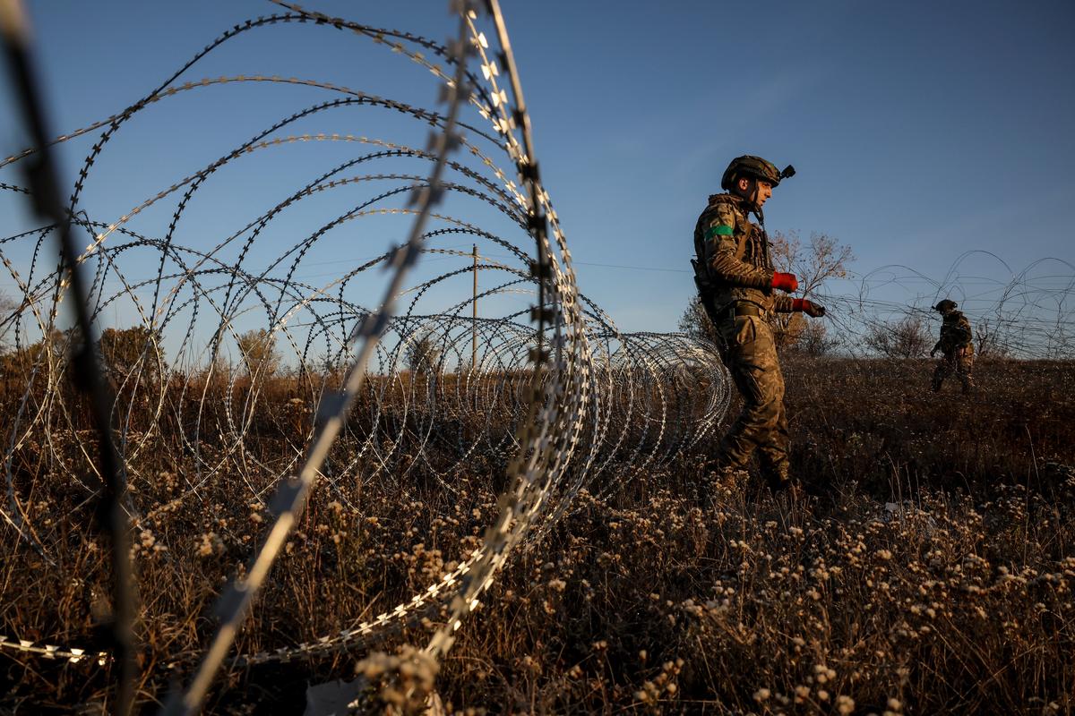 Ukrainian soldiers near the town of Chasiv Yar in Ukraine's Donetsk region, 30 October 2024. Photo: EPA-EFE/24TH MECHANIZED BRIGADE PRESS SERVICE