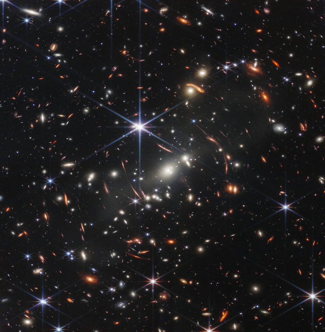 Скопление галактик, первое изображение с «Уэбба», полученное за 12.5 часов. Фото: nasa.gov