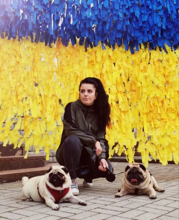 Nadia and the pugs. Photo courtesy of Nadia Valiukh