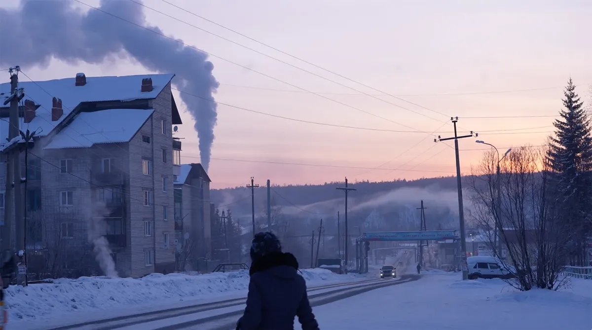 The village of Magistralny, Irkutsk region. A  shot from the film “Firewood for the mobilised”
