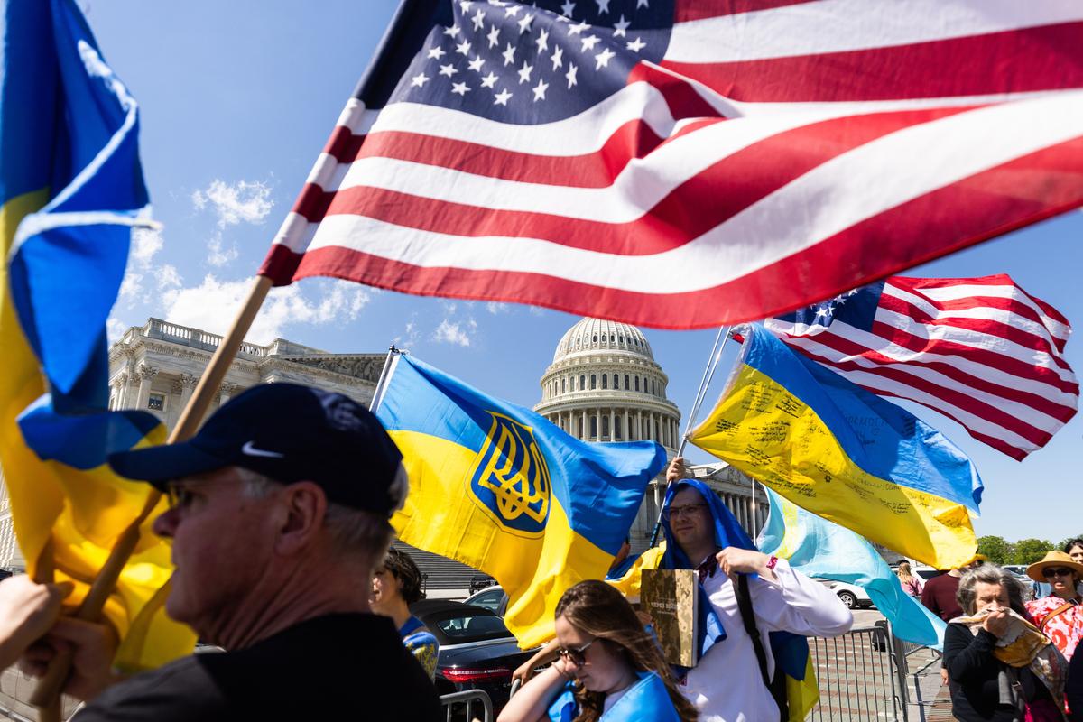 People rally outside Congress in support of the foreign aid package for Ukraine, Washington DC, 20 April 2024. Photo: JIM LO SCALZO