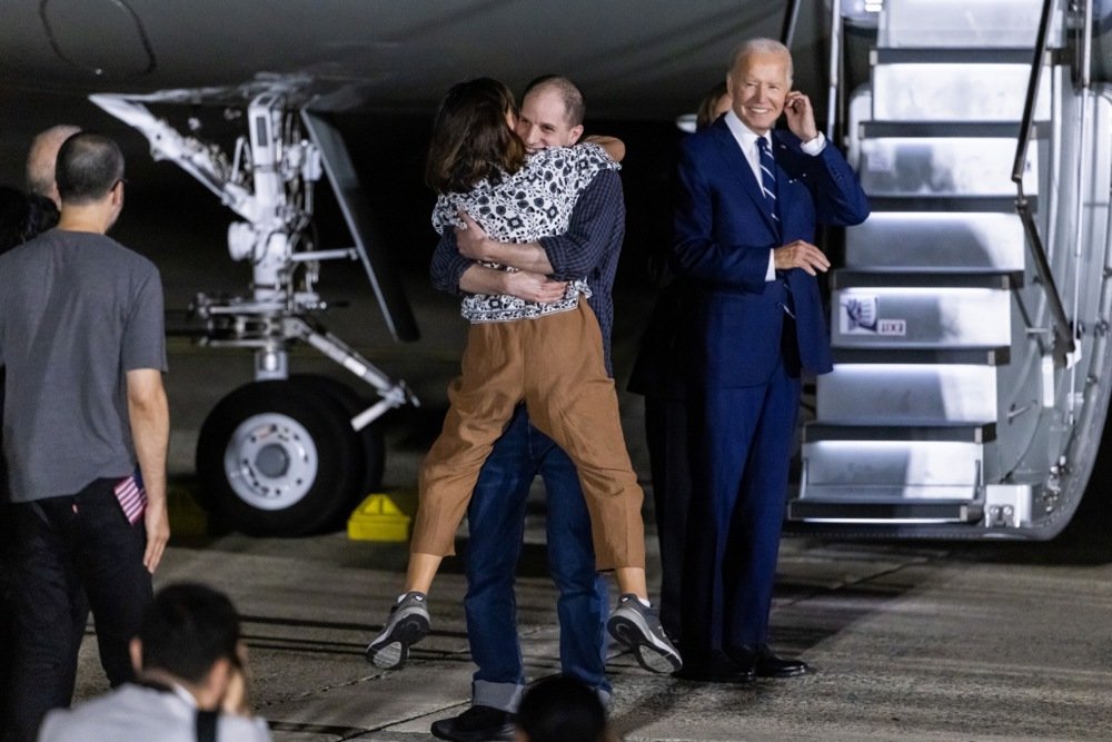 Wall Street Journal reporter Evan Gershkovich hugs his mother, Ella Milman, after his arrival in the US following a prisoner swap with the West at Andrews Air Base, Maryland, USA, 1 August 2024. EPA-EFE/JIM LO SCALZO