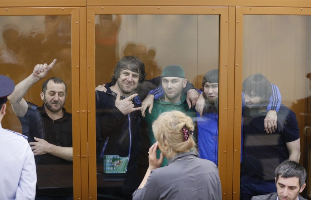 The five Chechen men accused of Nemtsov’s assassination are photographed during their July 2017 trial. All five were ultimately found guilty for carrying out a contract killing on Nemtsov. The identity of the person who ordered the hit officially remains unknown to this day. Photo: EPA/YURI KOCHETKOV