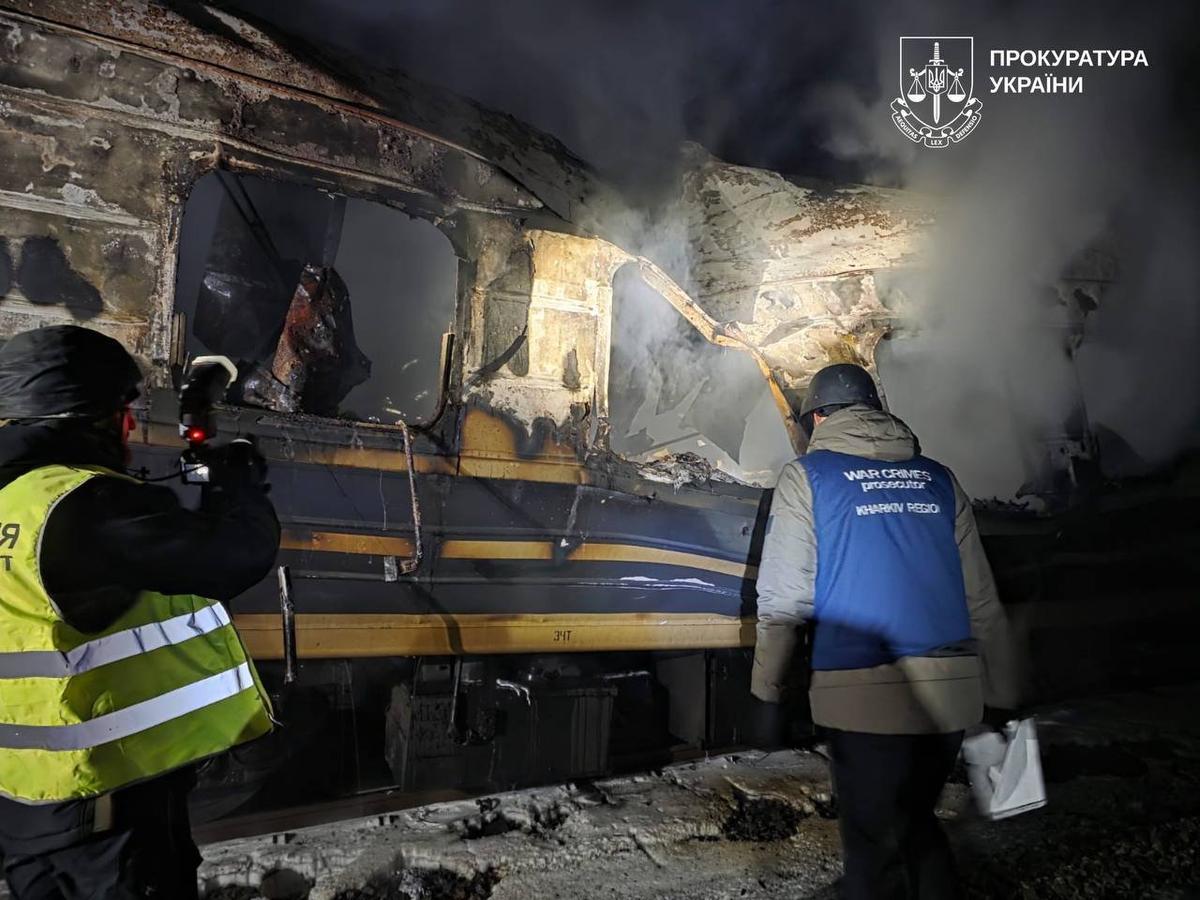 Investigators at the scene of a Russian drone strike on a passenger train near the village of Yazykove, Ukraine, 28 January 2026. Photo: Kharkiv region Prosecutor's Office