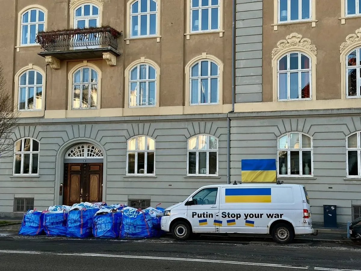 A van displaying the message “Putin, stop your war” parked in front of the Russian embassy in Copenhagen, Denmark. Photo: Daniel Thüler