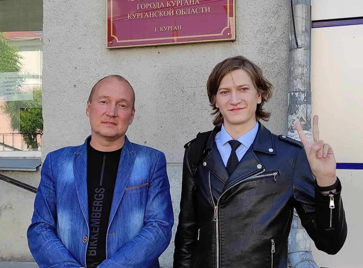 Schwarz with a lawyer outside the courthouse after a hearing on a criminal case for revealing the recording. Photo: Facebook