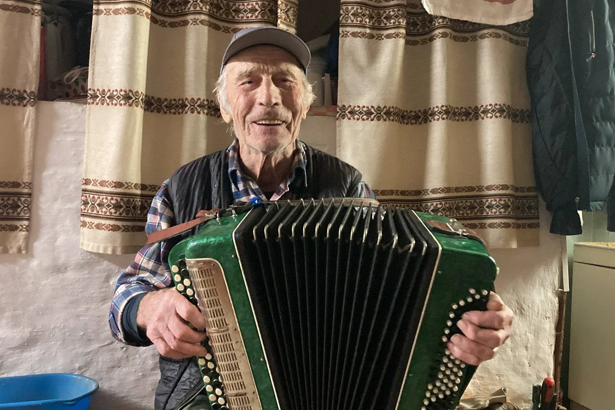 Yury plays the accordion. Photo: Irina Garina