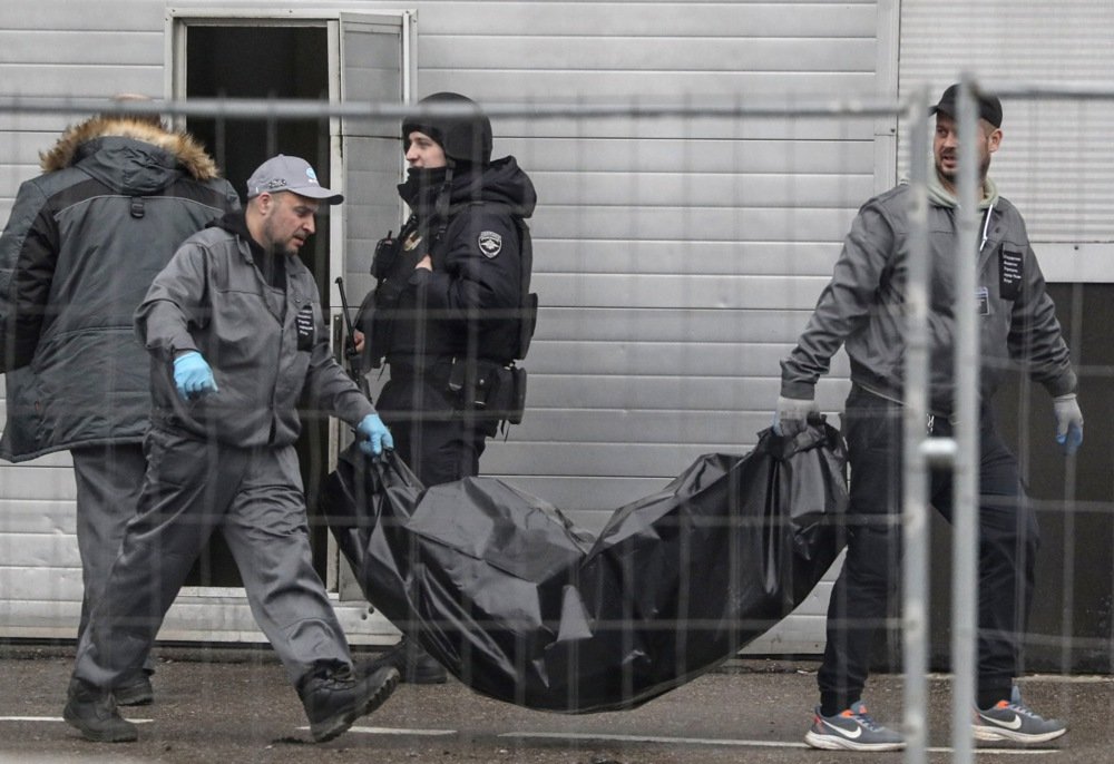 Medical staff remove victims’ bodies from the Crocus City Hall concert venue on Saturday morning. Photo: EPA-EFE/MAXIM SHIPENKOV