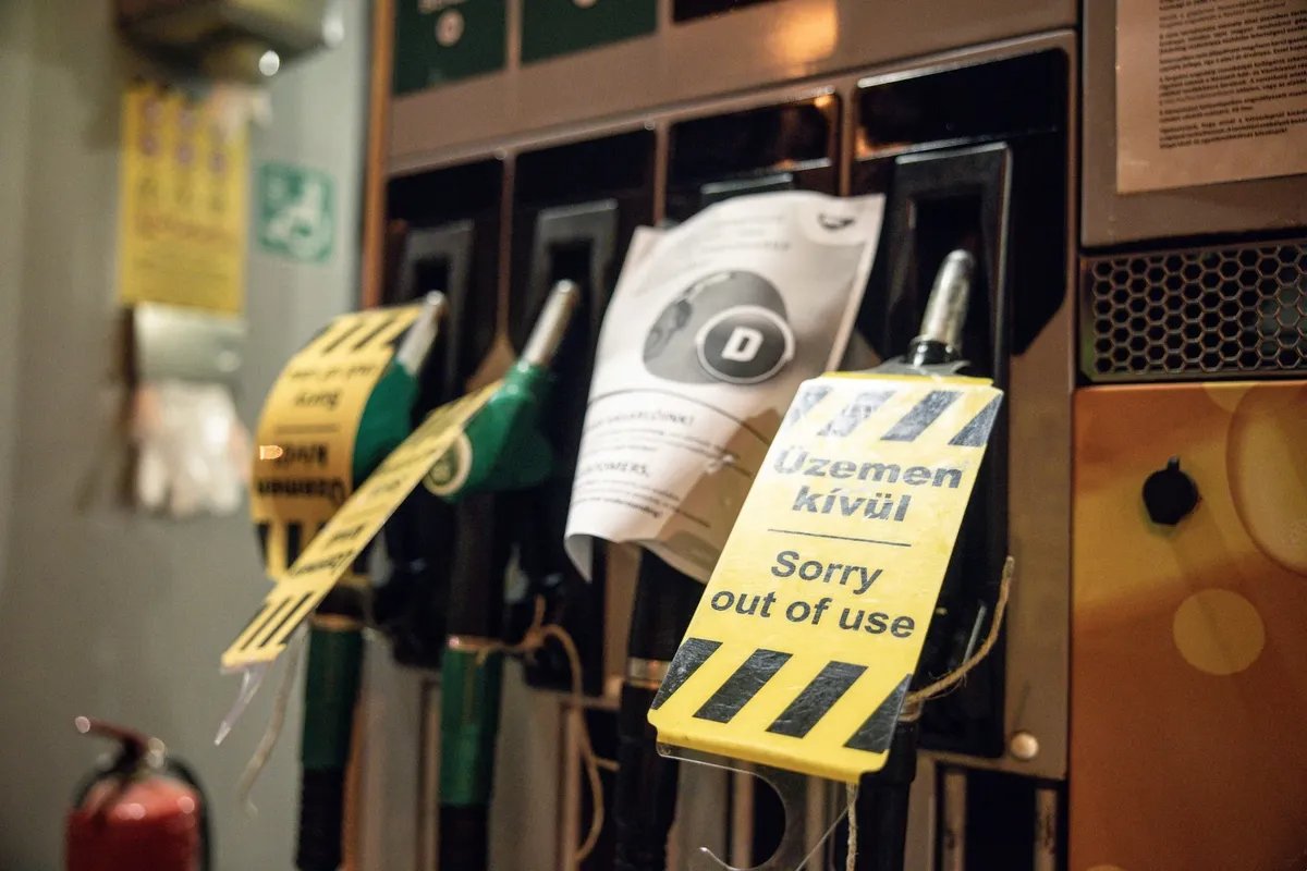 Signs reading “out of use” on empty fuel pumps at a MOL Hungary Oil & Gas Plc petroleum station in Budapest. Photo: Akos Stiller / Bloomberg / Getty Images