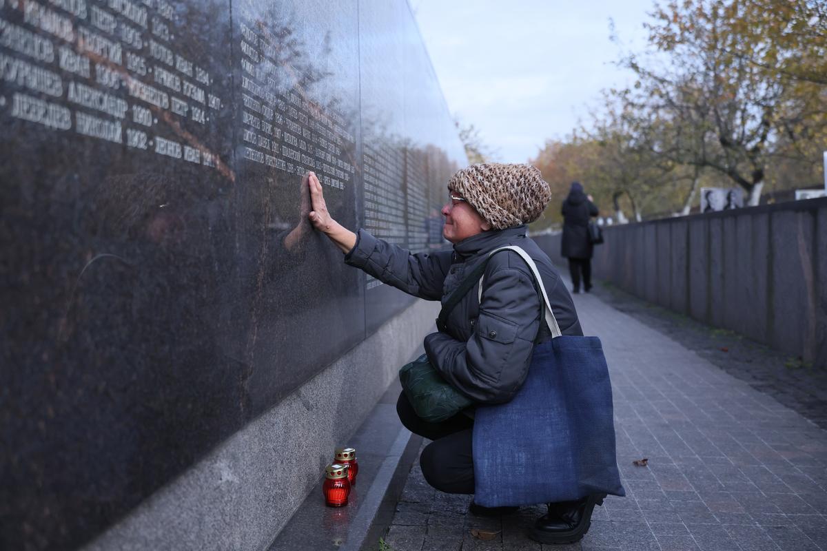 A visitor to the Butovo Shooting Range outside Moscow, where 20,762 people were executed during Stalin’s Great Terror in 1937-1938. Photo: EPA-EFE / MAXIM SHIPENKOV