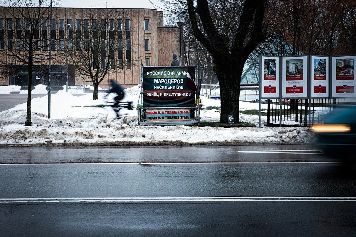 A poster opposite the Russian embassy in Riga, Latvia, reads “The Russian army [is made up ] of marauders, rapists, murderers and criminals”, 18 December 2023. Photo: Vladislav Dokshin / Novaya Europe
