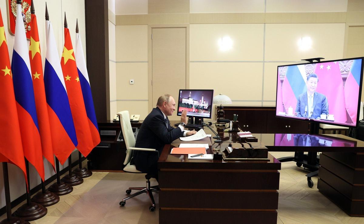 Владимир Путин и Си Цзиньпин. Фото: Kremlin Press Office / Handout/Anadolu Agency via Getty Images