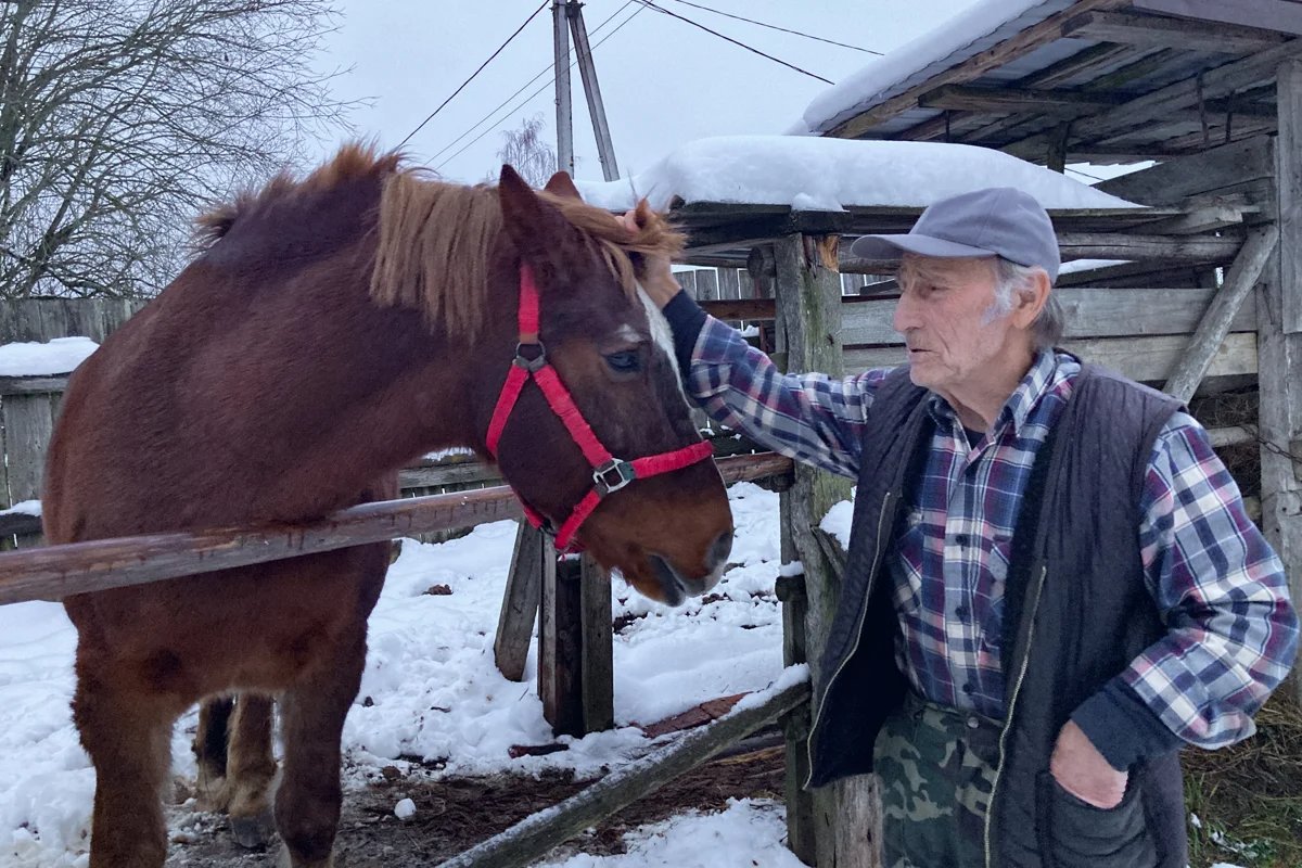 Yury with his horse, Boy. Photo: Irina Garina