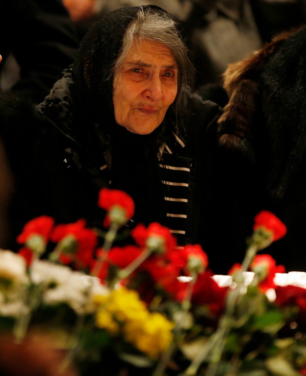 Дина Немцова на похоронах сына, 3 марта 2015 года. Фото: Сергей Ильницкий / EPA-EFE