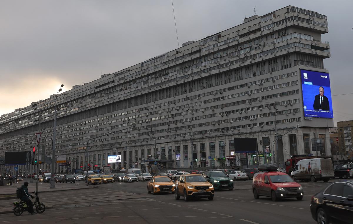 A giant screen displays a live broadcast of the Russian President Vladimir Putin's annual press conference, in Moscow, Russia, 19 December 2025. Photo: EPA / Maxim Shipenkov