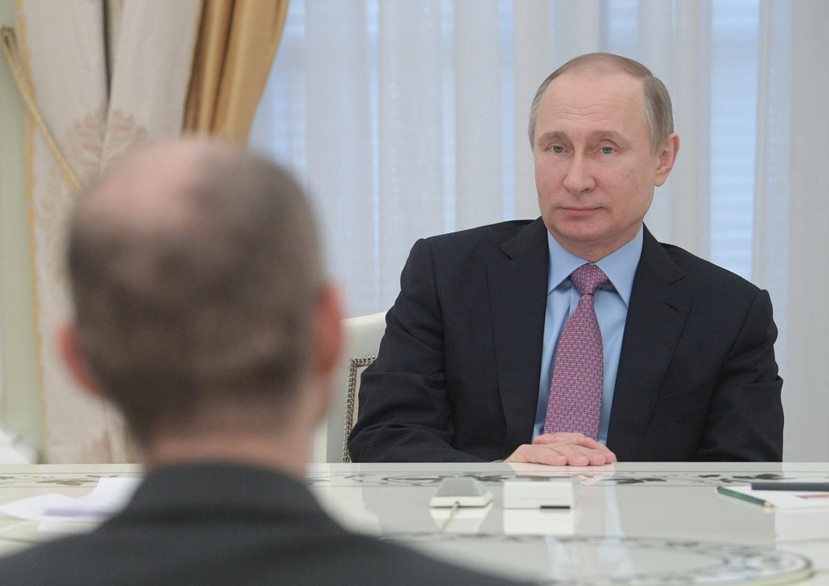 Vladimir Putin meets with the president of the Financial Action Task Force, Juan Manuel Vega-Serrano, in the Kremlin, Moscow, 26 April 2017. Photo: EPA / ALEXEI DRUZHININ / SPUTNIK / KREMLIN POOL