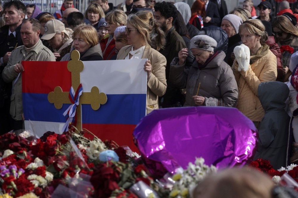 Mourners gather at victims’ memorial eight days after the Crocus City Hall attack. Photo: EPA-EFE/SERGEI ILNITSKY