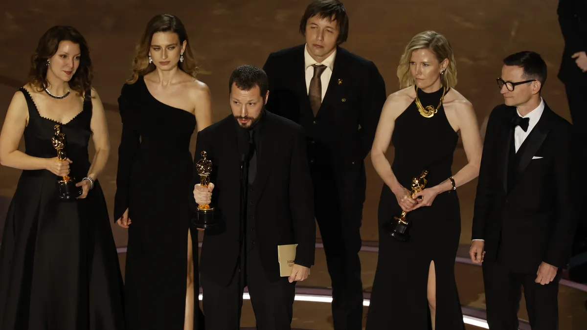 Mstyslav Chernov accepting the Oscar for Documentary Feature Film at the Academy Awards in Los Angeles, 10 March 2024. Photo: EPA-EFE/CAROLINE BREHMAN