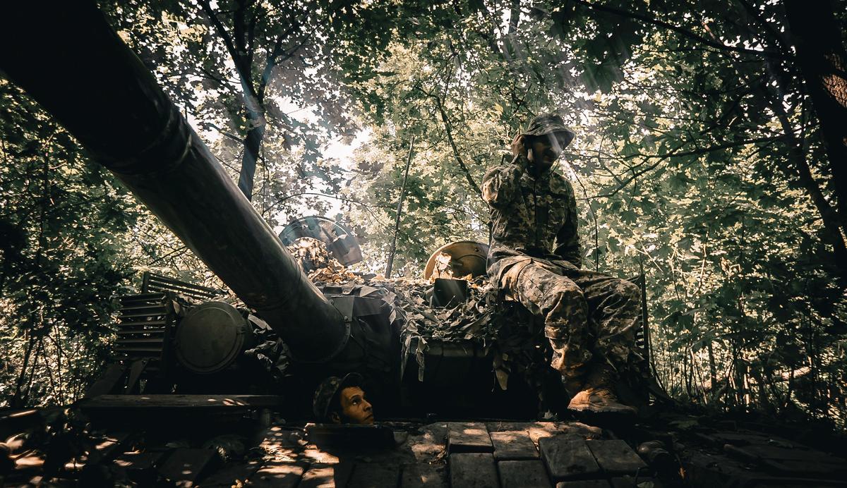 Members of Ukraine’s 59th Separate Motorized Infantry Brigade named after Yakiv Handziuk during repair work on a tank near a frontline in the Donetsk direction, eastern Ukraine, 02 July 2023. Photo by EPA-EFE/NIKOLETTA STOYANOVA