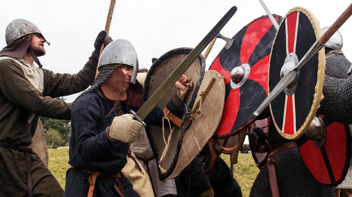 Participants prepare for the annual re-enactment of the Battle of Hastings, which in 1066 ended Anglo-Saxon dominance in England, at Battle Abbey, East Sussex, 15 October 2016. Photo: EPA / Will Oliver