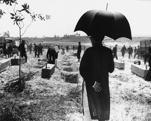 Interment for 300 unidentified victims of communist occupation of Hue in 1968. Photo by  United States Army