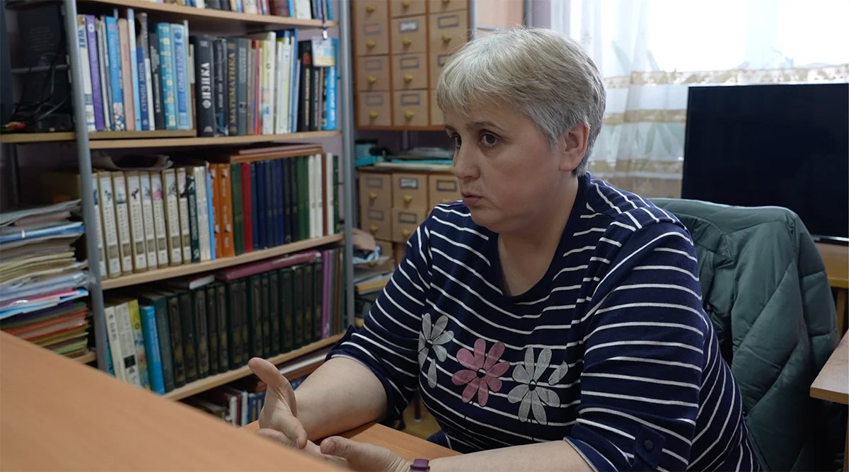 Librarian Lyubov, mother of a mobilised soldier.  A shot from the film “Firewood for the mobilised”