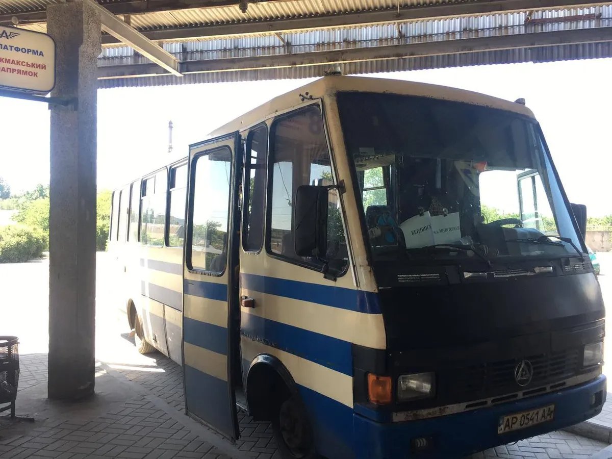The bus that awaits the passengers once they have crossed the border. Photo: Sonia Mustaeva