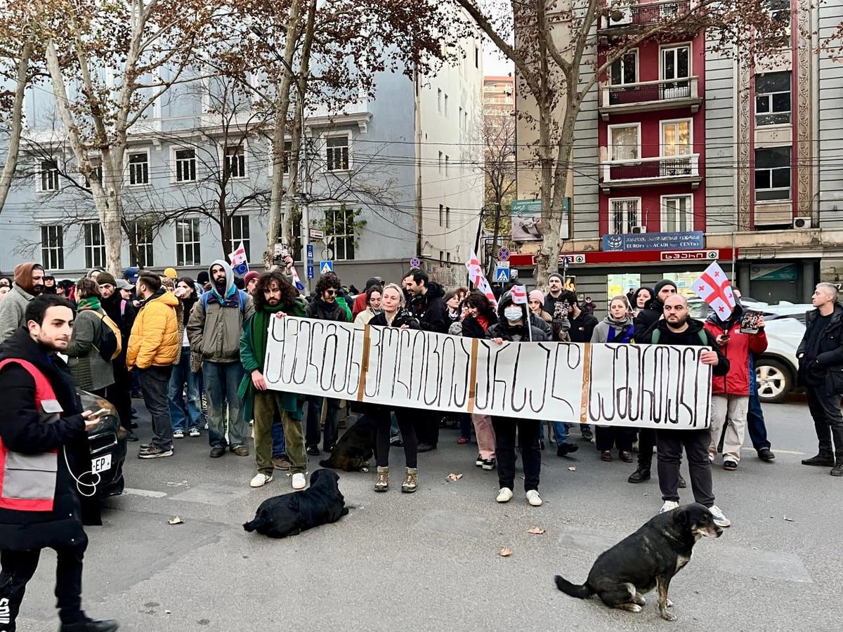 Members of Tbilisi’s artistic community protest against police violence on 9 December. The sign reads, “Police are everywhere, but justice is nowhere to be found”. Photo: Nicholas Pearce for Novaya Gazeta Europe