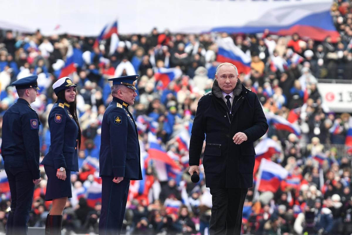 Russian President Vladimir Putin attends a rally at Moscow’s Luzhniki Stadium to mark Defender of the Fatherland Day on 22 February 2023. Photo: EPA-EFE / MAXIM BLINOV / SPUTNIK / KREMLIN POOL