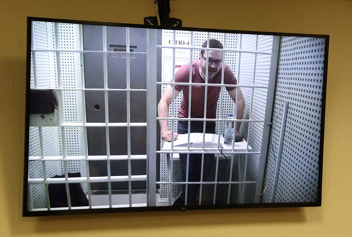 Russian political prisoner and opposition politician Ilya Yashin on a video link at an appeal hearing, 19 April 2023. Photo: Yulia Morozova / REUTERS / Scanpix / LETA