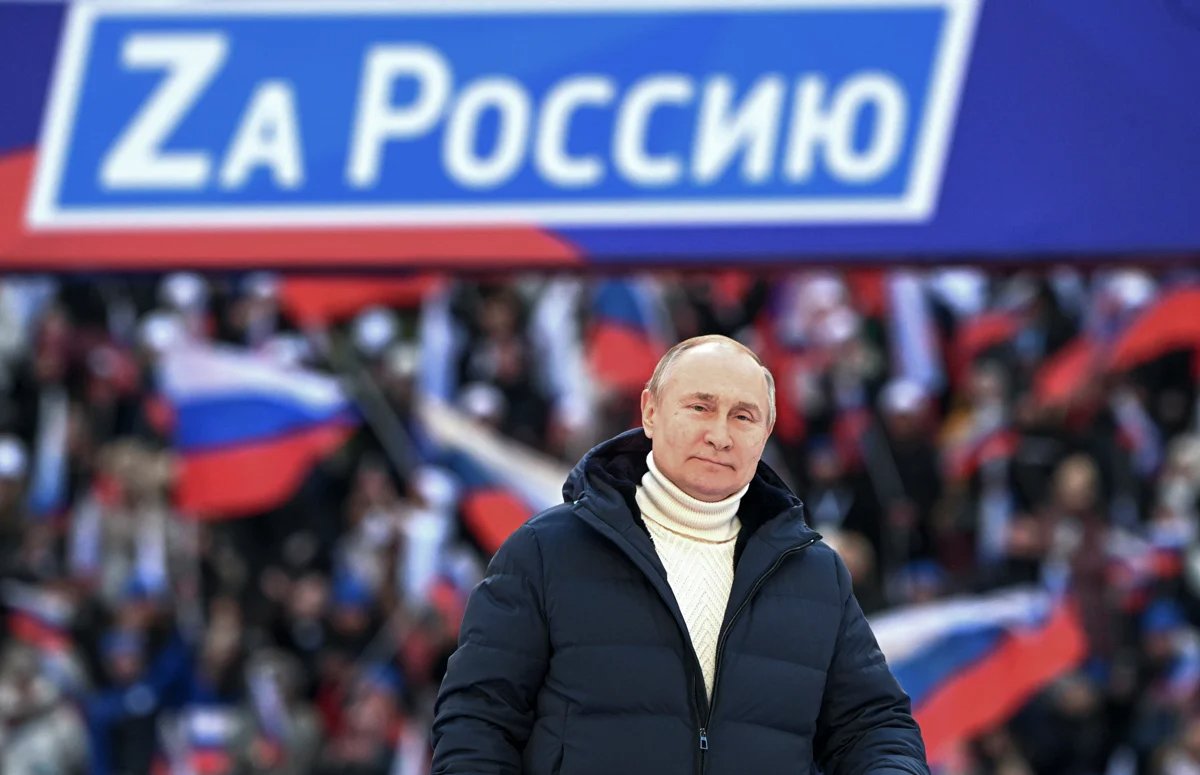 Putin delivers a speech at Moscow’s Luzhniki Stadium during a holiday concert to mark the anniversary of Russia’s annexation of Crimea, 18 March 2022. Photo: Ramil Sitdikov / Sputnik / EPA-EFE