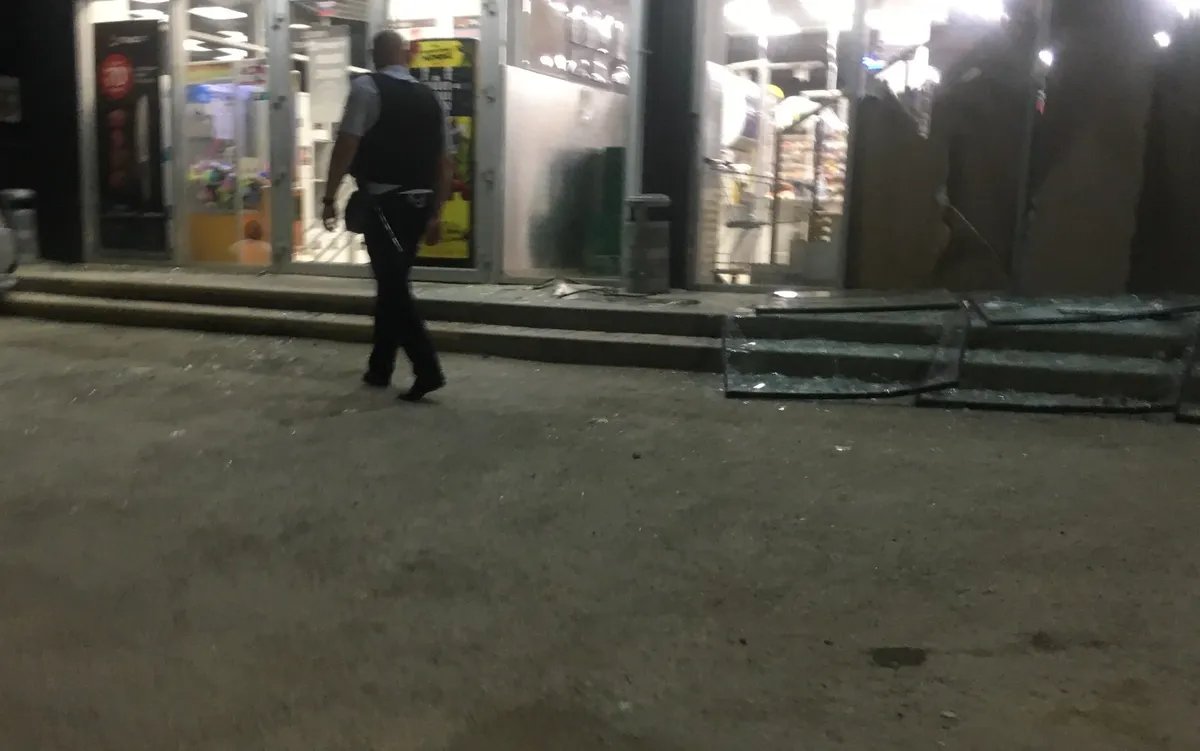 Not only residential buildings, but also local stores had their windows smashed. Photo by Sonia Mustaeva