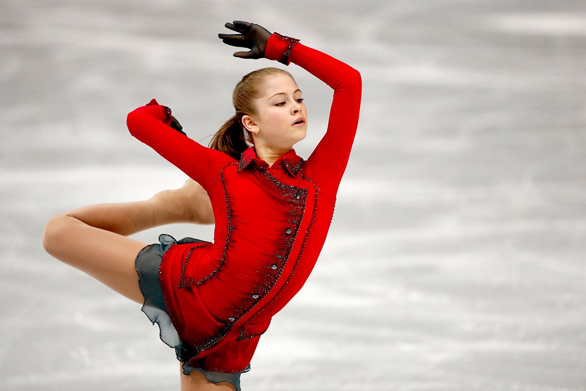 Юлия Липницкая в произвольной программе командных соревнований по фигурному катанию на Олимпийских играх в Сочи, 9 февраля 2014 года. Фото: Barbara Walton / EPA