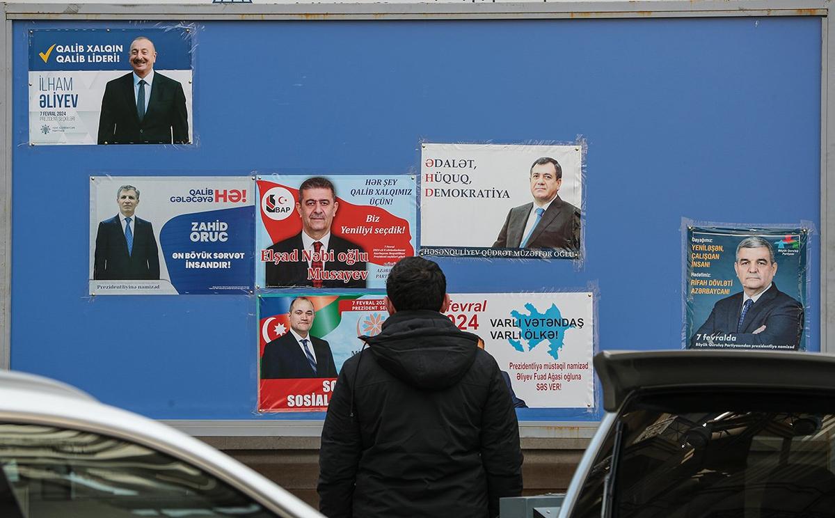 Предвыборные плакаты кандидатов на внеочередных президентских выборах, 5 февраля 2024 года. Фото: Роман Исмаилов / EPA-EFE