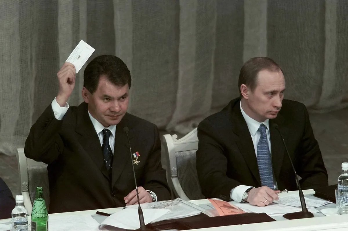 Acting Russian President Vladimir Putin and Emergencies Minister Sergey Shoigu vote during the Unity party congress, at the Moscow Kremlin, 27 February 2000. Photo: EPA PHOTO EPA/SERGEY CHIRIKOV
