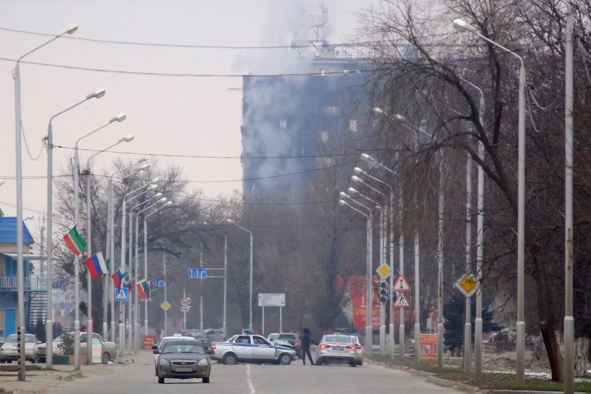 Smoke rises from the site of an alleged terror attack in the centre of Grozny, Chechnya, 4 December 2014. Photo: ERA / KAZBEK VAHKEV.