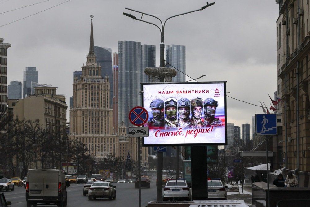 A military-themed billboard in Moscow. Photo: EPA-EFE/YURI KOCHETKOV