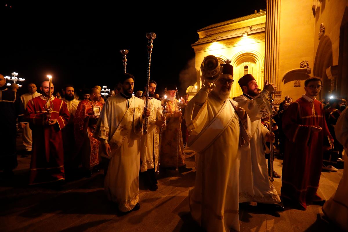 Orthodox believers attend an Easter service in Tbilisi, 15 April 2023. Photo: ZURAB KURTSIKIDZE