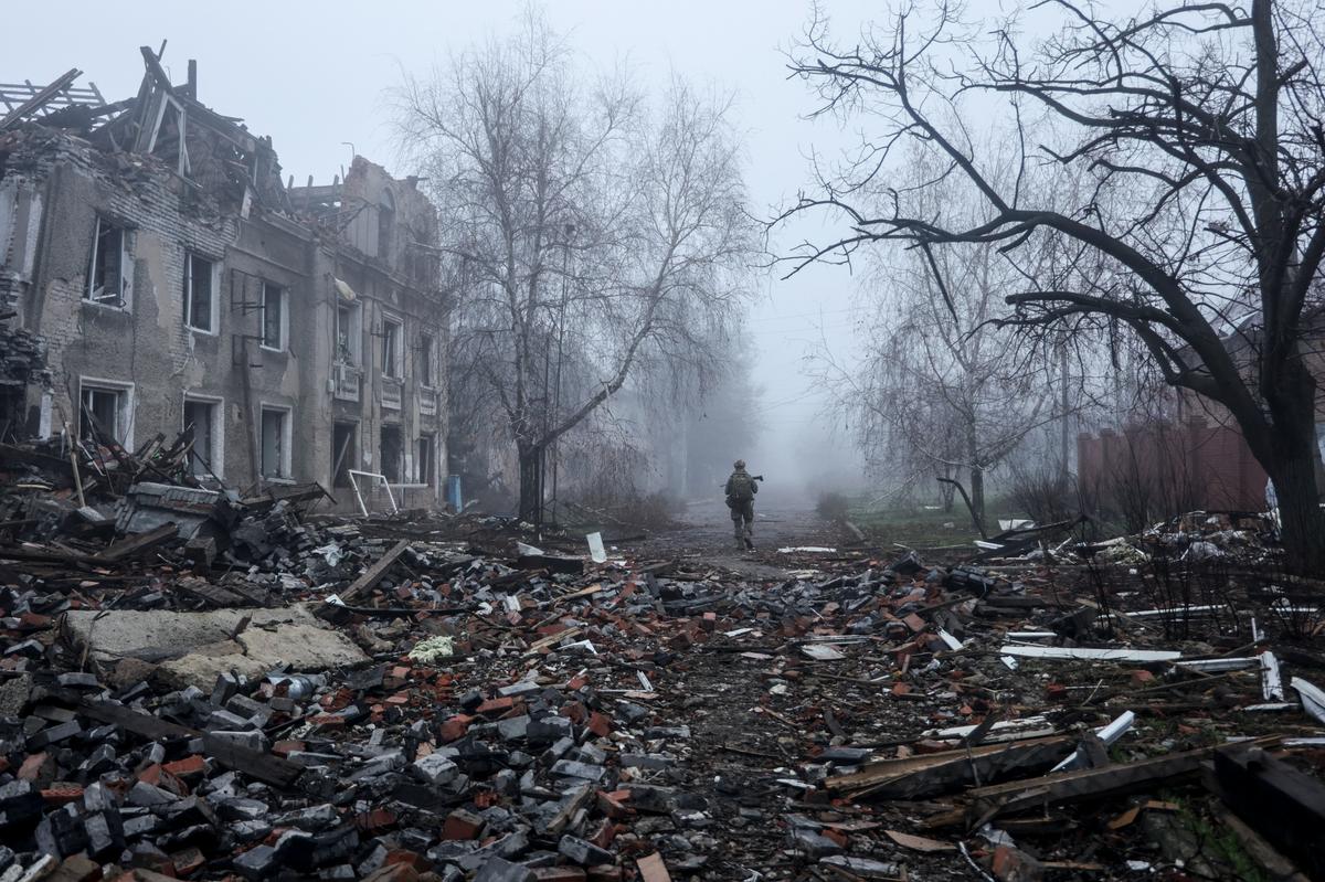 A Ukrainian serviceman walks through the ruins of the Donetsk region city of Kostyantynivka in eastern Ukraine, 28 November 2025. Photo: EPA / AFU
