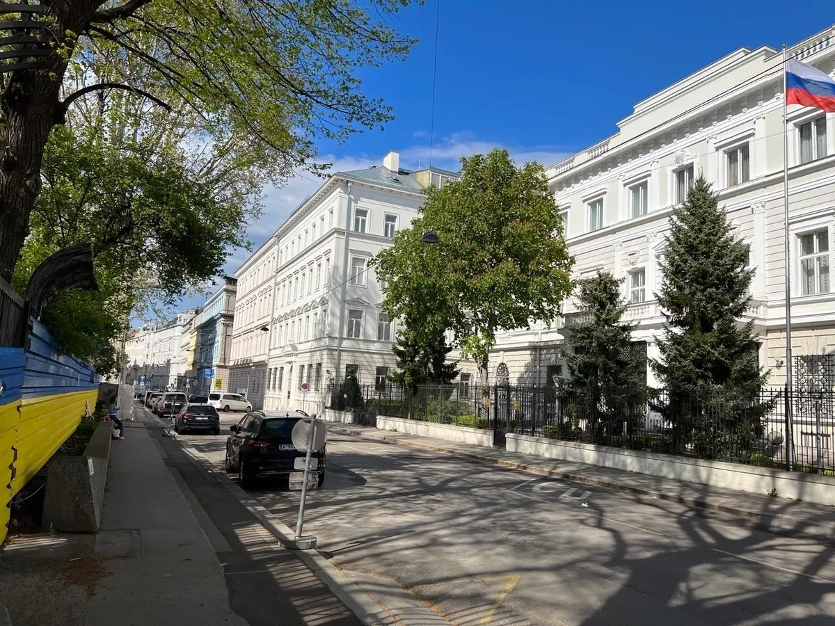 The fence outside the Russian embassy in Vienna, Austria, is painted in the colours of the Ukrainian flag. Photo: Pyotr Petrenko